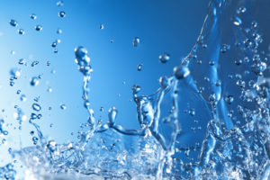 abstract splash of water on a blue background